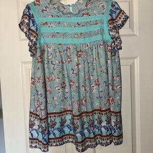 Floral Patterned Blouse with Ruffle Sleeves